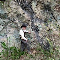 Steve Maynard, VP Exploration for Minaurum inspecting a copper-oxide mineralization at Adelita