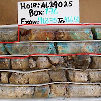 AL19-025_Promontorio vein zone_AL19-025_463.75-466.50 – “Las Guijas vein, part of Promontorio zone.  Vein zone is partly oxidized, with the presence of chrysocolla.  The sample interval 463.85-464.80 (0.95 m) (red outline) assayed 1.566 kg/t Ag, 6.719 g/t Au, 4.48% Cu, 9.27 % Pb, 10.68% Zn.”